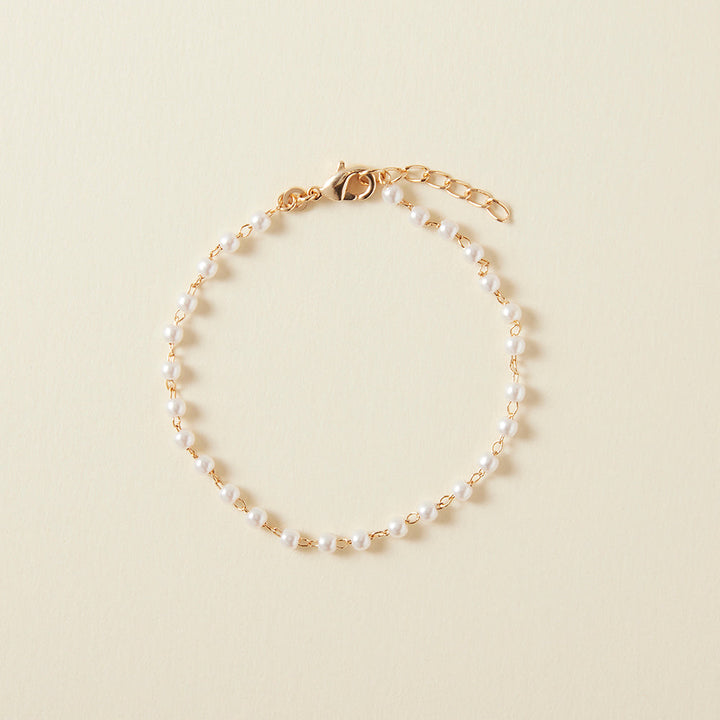 Bracelet chaîne & perles d'imitation en plaqué or