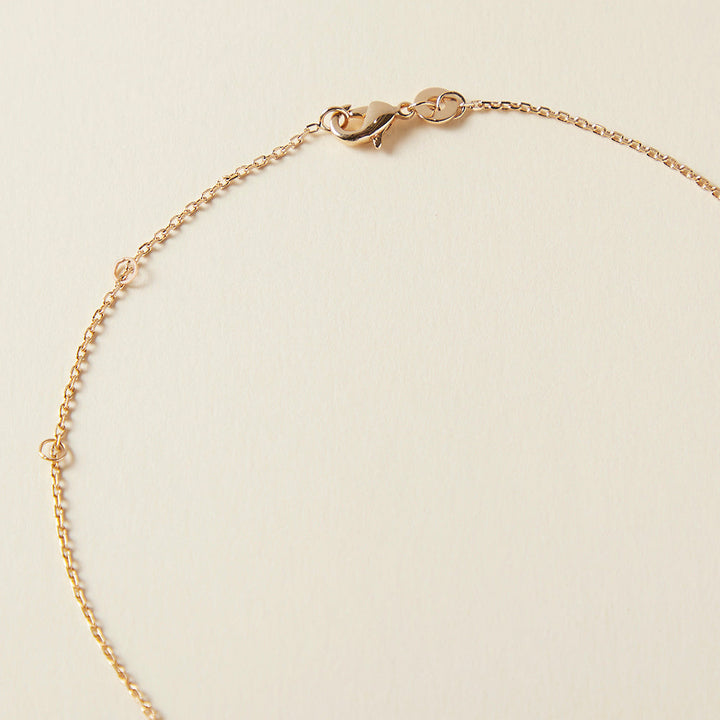 Collier double anneaux ondulés en plaqué or