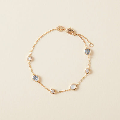 Bracelet serti d'oxyde de zirconium bleu et pierre de lune en plaqué or